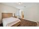 Charming bedroom boasts wood-look floors, a window, and a relaxing atmosphere at 12831 White Bluff Rd, Hudson, FL 34669