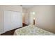Comfortable bedroom with ample closet space and a convenient bathroom access at 12831 White Bluff Rd, Hudson, FL 34669