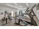 Well-equipped community gym with various exercise machines, mirrors, and plenty of room to workout at 12831 White Bluff Rd, Hudson, FL 34669
