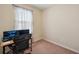 Office space with carpet, a window, and a desk with monitors at 12831 White Bluff Rd, Hudson, FL 34669