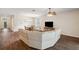 Open-concept layout seamlessly connects the living, dining, and kitchen areas, perfect for modern living and entertaining at 12831 White Bluff Rd, Hudson, FL 34669