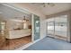 Enclosed patio with a view of the living room and access to outdoor space at 12831 White Bluff Rd, Hudson, FL 34669