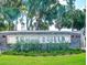 Summerfield community entrance sign framed by lush landscaping and manicured lawn creating a welcoming first impression at 13613 Laraway Dr, Riverview, FL 33579