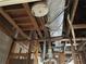 Open framed ceiling with ductwork and wiring in a basement at 1503 12Th Se Ct # 1503, Largo, FL 33771
