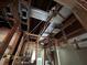 A bathroom renovation reveals piping, electrical and exposed roof rafters at 1503 12Th Se Ct # 1503, Largo, FL 33771