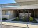 Charming condo complex featuring covered parking, stone accents, and attractive landscaping at 1503 12Th Se Ct # 1503, Largo, FL 33771