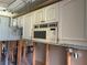 View of hanging kitchen cabinets with microwave at 1503 12Th Se Ct # 1503, Largo, FL 33771