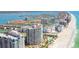 Stunning aerial view of beachfront condos and coastal waterways of Sand Key, Florida at 1560 Gulf Blvd # 306, Clearwater Beach, FL 33767