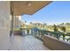 Balcony offering panoramic vistas of lush landscaping and shimmering ocean waters at 1560 Gulf Blvd # 306, Clearwater Beach, FL 33767