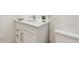 Bathroom vanity with undermount sink, sleek faucet, and modern drawers with polished hardware at 1560 Gulf Blvd # 306, Clearwater Beach, FL 33767