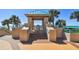 Picturesque beach access featuring a shaded gazebo and stunning ocean views, perfect for relaxing or entertaining at 1560 Gulf Blvd # 306, Clearwater Beach, FL 33767