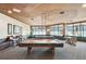 Beautiful billiards room with two tables, bar seating and plenty of natural light at 1560 Gulf Blvd # 306, Clearwater Beach, FL 33767