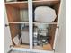 Modern cabinet interior featuring stainless steel components and ample storage at 1560 Gulf Blvd # 306, Clearwater Beach, FL 33767
