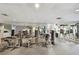 Spacious exercise room with mirrored walls and modern weight training equipment at 1560 Gulf Blvd # 306, Clearwater Beach, FL 33767