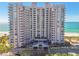 Expansive high-rise condominium with oceanfront views, elegant balconies, tennis courts, and an outdoor swimming pool at 1560 Gulf Blvd # 306, Clearwater Beach, FL 33767
