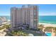 Elegant high-rise condo building showcasing oceanfront views, resort-style amenities, and beautiful coastal living at 1560 Gulf Blvd # 306, Clearwater Beach, FL 33767
