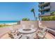 Inviting fire pit with chairs, perfect for relaxing evenings with a view of the ocean at 1560 Gulf Blvd # 306, Clearwater Beach, FL 33767