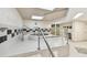 An indoor hot tub with a tiled floor and hand rails at 1560 Gulf Blvd # 306, Clearwater Beach, FL 33767