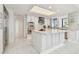 Elegant kitchen with a large center island, stainless steel appliances, and marble countertops at 1560 Gulf Blvd # 306, Clearwater Beach, FL 33767