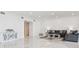 Spacious living room with comfortable seating and modern decor at 1560 Gulf Blvd # 306, Clearwater Beach, FL 33767