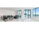 Bright living room with ocean views and ample seating at 1560 Gulf Blvd # 306, Clearwater Beach, FL 33767