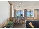 A lounge area shows bar stools, a sofa, and a view of the ocean at 1560 Gulf Blvd # 306, Clearwater Beach, FL 33767