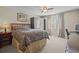 Bedroom with carpeted floors, closet storage, and natural light, ideal for comfort and functionality at 19101 Marisa Ridge Pl, Tampa, FL 33647