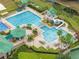 Aerial view of community pool area, with large pool, splash pool and lounge area at 19101 Marisa Ridge Pl, Tampa, FL 33647