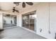 Covered screened-in patio features sliding glass doors that opens to the backyard at 1913 Peppertree Dr, Oldsmar, FL 34677