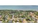 Aerial image showing a home near lush trees and a beautiful waterfront community at 2001 Pinellas Point S Dr, St Petersburg, FL 33712