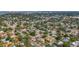 Wide aerial view of a neighborhood featuring mature trees and single-story homes at 2001 Pinellas Point S Dr, St Petersburg, FL 33712