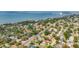 Scenic aerial view of a charming neighborhood near the water, offering a serene coastal lifestyle at 2001 Pinellas Point S Dr, St Petersburg, FL 33712