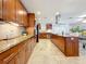 Spacious kitchen featuring granite counters, stainless appliances, and central island at 2001 Pinellas Point S Dr, St Petersburg, FL 33712