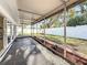 Covered patio has a concrete floor and views of the fenced backyard at 2001 Pinellas Point S Dr, St Petersburg, FL 33712
