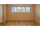 Bright bedroom with neutral decor and large window, creating a relaxing retreat at 2071 Australia W Way # 59, Clearwater, FL 33763