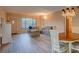 Comfortable living room with dining area featuring stylish furniture and modern lighting at 2071 Australia W Way # 59, Clearwater, FL 33763