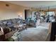Cozy living room with plush sofas, soft rug, and inviting decor at 2071 Australia W Way # 59, Clearwater, FL 33763