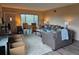 Open living area with comfortable seating, a large window, and ample natural light at 2071 Australia W Way # 59, Clearwater, FL 33763