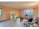 Inviting living room featuring modern decor, sleek flooring, and abundant natural light at 2071 Australia W Way # 59, Clearwater, FL 33763