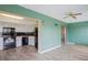Open-concept space with a modern kitchen and a cozy living area, perfect for entertaining guests at 2071 Australia W Way # 59, Clearwater, FL 33763