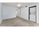 Bedroom featuring carpet, closet space and three doorways at 2460 Persian Dr # 54, Clearwater, FL 33763