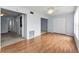 Spacious living area featuring hardwood floors, closet space and an open floorplan at 2460 Persian Dr # 54, Clearwater, FL 33763