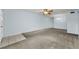 Spacious living room featuring carpet at 2460 Persian Dr # 54, Clearwater, FL 33763