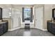 Bright bathroom featuring a walk-in shower, soaking tub, and a large window at 25330 Conestoga Dr, Land O Lakes, FL 34639