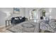 Inviting living room featuring gray walls and a view of the front entry at 25330 Conestoga Dr, Land O Lakes, FL 34639