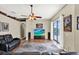 Relaxing living room with hardwood floor, ceiling fan, and access to outdoor pool at 25330 Conestoga Dr, Land O Lakes, FL 34639