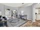 Open floor plan with living room and dining area featuring stylish area rug at 25330 Conestoga Dr, Land O Lakes, FL 34639