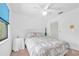 Clean bedroom offering neutral decor, a ceiling fan, and natural light at 3177 Montrose Pl, Palm Harbor, FL 34684