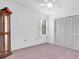 Bedroom with a closet and a neutral color palette, creating a relaxing atmosphere at 3177 Montrose Pl, Palm Harbor, FL 34684