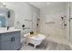 This bathroom features dual sinks, a claw foot tub, and a glass shower at 3238 Cullendale Dr, Tampa, FL 33618